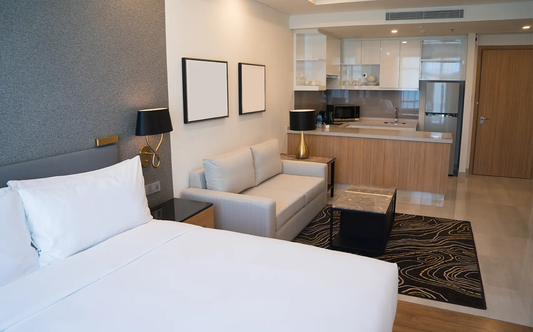 Modular wardrobe and built-in storage solutions for 1BHK apartment