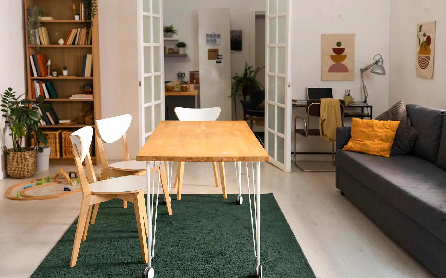 Sofa-cum-bed setup with hidden storage in a modern minimalist home